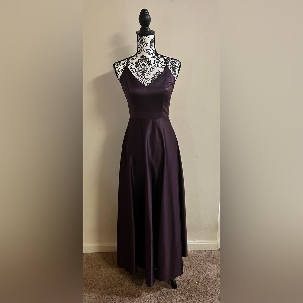 David’s Bridal. Celebrate DB studio plum gown with pockets.